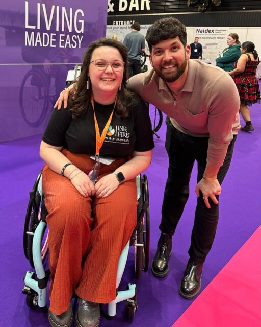 Naidex Day 1 - it absolutely made my week to meet @mrcolitiscrohns for the first time. 🙌🏻✨ Thank you for stopping to get a photo Mesha!VD: A woman in a wheelchair wearing a black tshirt, sitting next to a man wearing a beige jumper - both smiling.