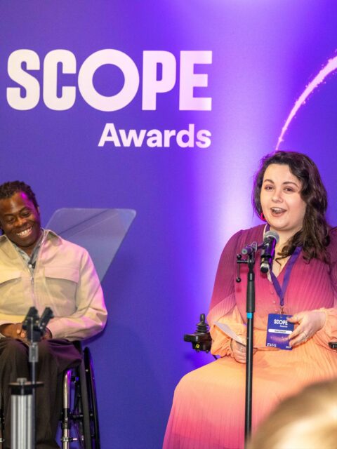 Not Inkfire just casually presenting a Scope award last month on stage with Ade Adepitan - a totally normal day in the office!It's taken me all month to recover myself so I could post about it!VD: Image 1: Imali on stage with Ade Adeptian, with the Scope awards logo in the background. She is speaking into a microphone.
Image 2: A selfie of Ade, Cameron and Imali in the Scope awards venue. Everyone is smiling (a lot!)
Image 3: Imali sitting in front of the Scope photograph wall. I am wearing a purple to orange ombre dress that blends well and I have curled brown hair which is shoulder length.